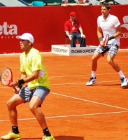 Ролан Гаррос 2013. Мирный и Текау вышли во второй круг.